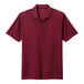 A red Nike Dri-Fit polo with a Nike logo on the chest.