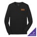 A Port & Company black long sleeve shirt on a counter.