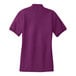 A Port Authority deep berry polo shirt for women.