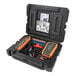 A black case with an orange and black Klein Tools electrical device and other equipment.