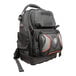 A black Klein Tools backpack with orange accents and a zipper.