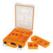 An orange plastic Klein Tools component box with clear compartments.