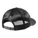 A New Era heather graphite and black trucker cap with a black mesh back.