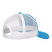 A blue and white Port Authority trucker cap with mesh back.