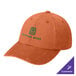 An orange Port Authority dad cap with green text that says "Divine Wine".