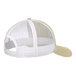 A white and tan Port Authority trucker cap with mesh back.