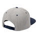 A heather grey and true navy 6-panel cap with grey and blue stripes on the bill.