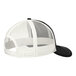 A black and white Port Authority trucker cap with mesh back.