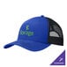 A blue and black Port Authority trucker cap with the Forge logo on the front and mesh back.
