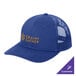 A blue Port Authority trucker cap with a logo on it and a mesh back.