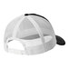 A black and white Port Authority trucker cap with a mesh back.