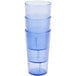 A stack of three Cambro slate blue plastic tumblers.