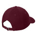 A maroon Port & Company dad cap with a metal buckle on the back.