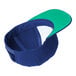 A blue and green Sport-Tek 6-panel cap with a green brim.