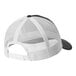 A white and black Port Authority trucker cap with a mesh back.