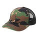 A Port Authority camo trucker cap with a black mesh back.
