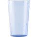 A clear plastic tumbler with a blue rim.