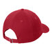 A red Port & Company dad cap with a white background.