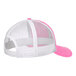 A pink and white Port Authority trucker cap with mesh back.
