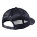 A New Era heather navy trucker cap with a navy mesh back.