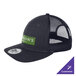 A New Era navy and black trucker cap with a green and black crow logo on the table.