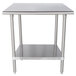 An Advance Tabco stainless steel work table with a stainless steel undershelf.