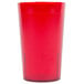 A close-up of a red textured Cambro plastic tumbler.