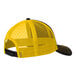 A black trucker cap with yellow and black accents and a black mesh back.