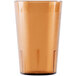 A clear plastic tumbler with an amber rim.
