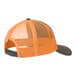 A grey and neon orange Port Authority trucker cap with a mesh back.