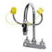 A Bradley faucet mount eyewash with yellow caps.