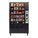 A Selectivend vending machine with snacks on shelves.