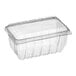 A D&W Fine Pack clear plastic container with a lid.
