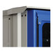 A blue and white vending machine with a door.