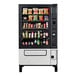 A Selectivend Evolution vending machine with snacks and drinks.