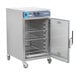 A stainless steel Alto-Shaam cook and hold oven with a door open.