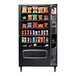 A Selectivend snack vending machine with snacks on shelves.