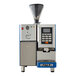 An Astra Super Mega I bean to cup coffee machine in blue and white with a screen and buttons.