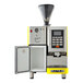 A yellow Astra Super Mega automatic coffee machine with a small cup.