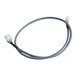 A close-up of a grey Estella Caffe PCB cable with white connectors.