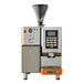An orange and white Astra Super Mega I automatic coffee machine with a screen and door.