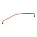 A copper pipe with a brass nut on one end and a red tube on the other.