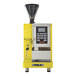 A yellow and silver Astra A2000 super automatic espresso machine with buttons and a screen.