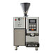 An Astra Super Mega automatic coffee machine in gloss black with a screen and a filter.