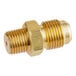 A brass threaded male connector with a gold nut.