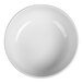 A HydroZero Ivory by Oneida porcelain bowl with a curved edge on a white background.
