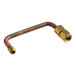A metal pipe with brass fittings on each end.