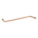 A long brown copper pipe with a couple of holes.