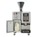 An Astra Super Mega automatic coffee machine with a jug of milk on the side.