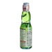 A close up of a green Hana Ramune Melon Soda bottle with a white label.